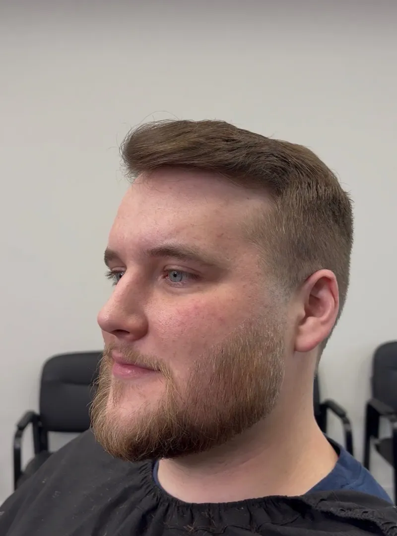 Same client after a clean fade and shaped beard.