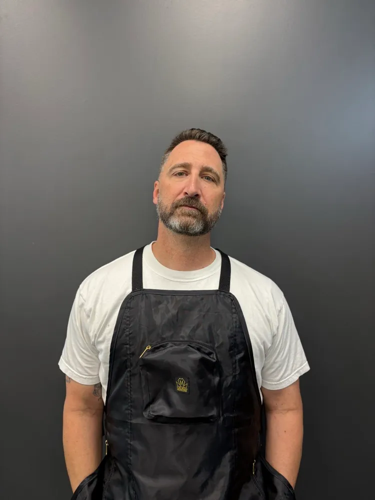 Mike, master barber at Main Street Barbers in Heber City.